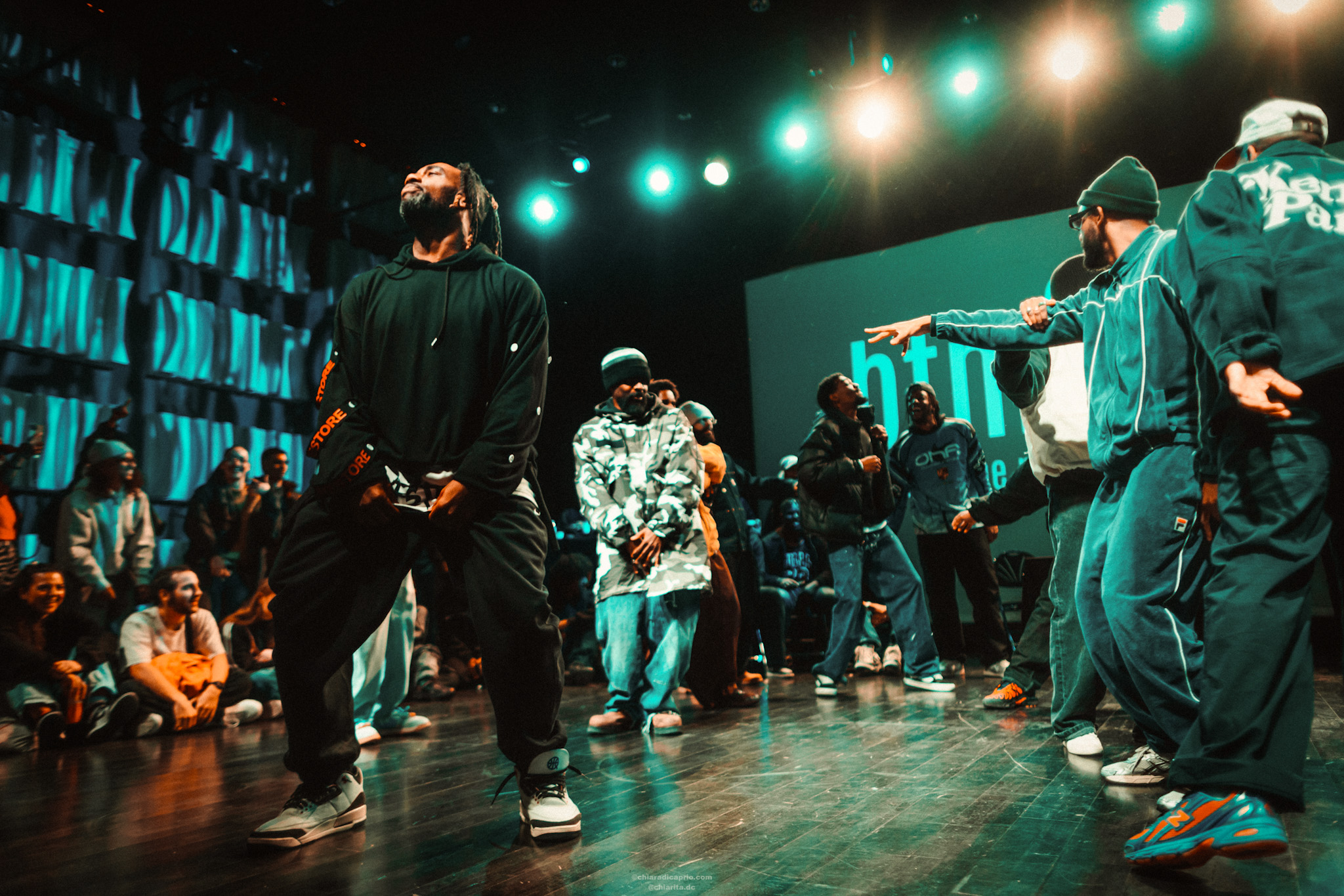 Two dancers smiling at each other during a BTM battle