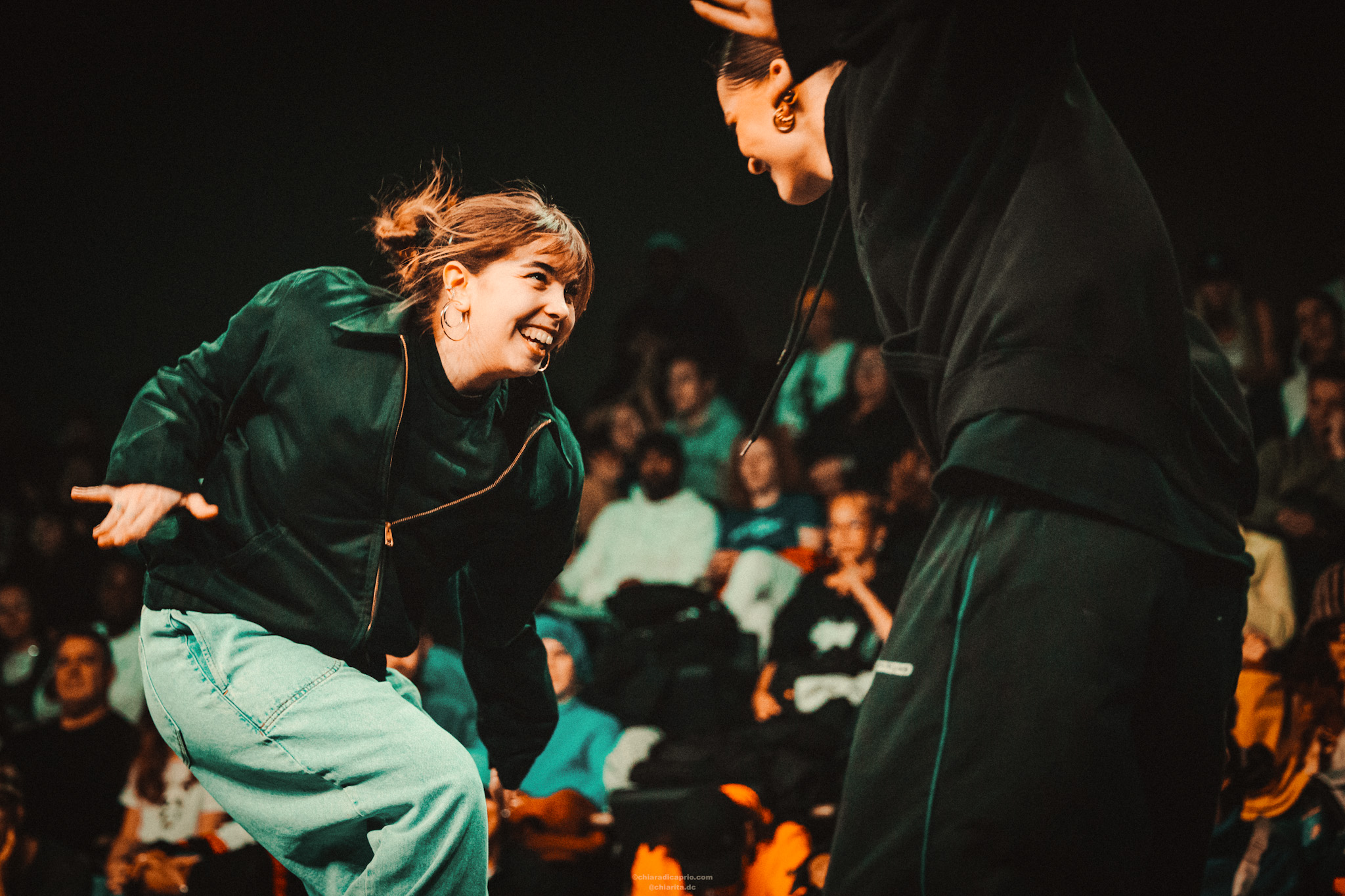 Two BTM Tribe members hugging at an event